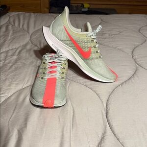 Nike Running Sneakers in Pale Mint with Bright Coral Swoosh